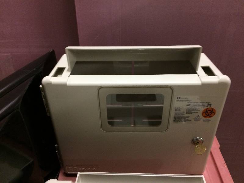 lot 61 image: Mixed Lot Of Clinic Magazine Brochure Holders Covidien Used Needle Locking Cabinets Etc