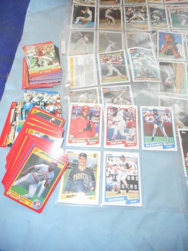 AROUND 200 BASEBALL CARDS AND FOOTBALL ALSO