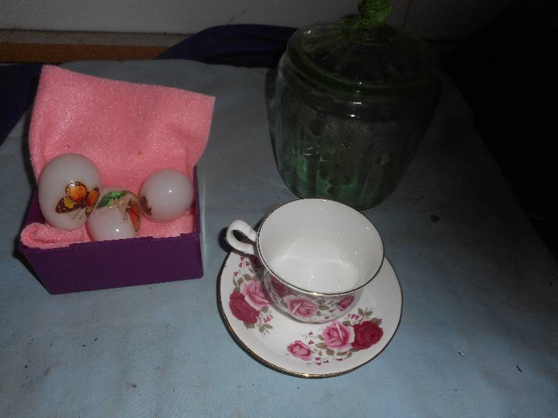 3 ANTIQUE GLASS EGGS AND GREEN DEPRESSION COOKIE JAR AND QUEEN CHINA TEA CUP AND SAUCER