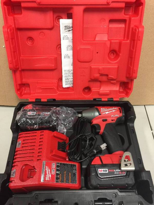 lot 5 image: Milwaukee M18 FUEL 18-Volt Lithium-Ion Brushless 38 in. Compact Impact Wrench with Friction Ring Kit Model#  2754-22 open box never used