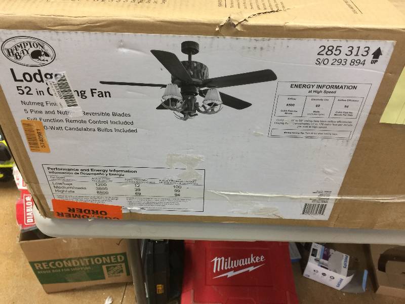 lot 72 image: Hampton Bay Lodge 52 in. Nutmeg Ceiling Fanopen box never used