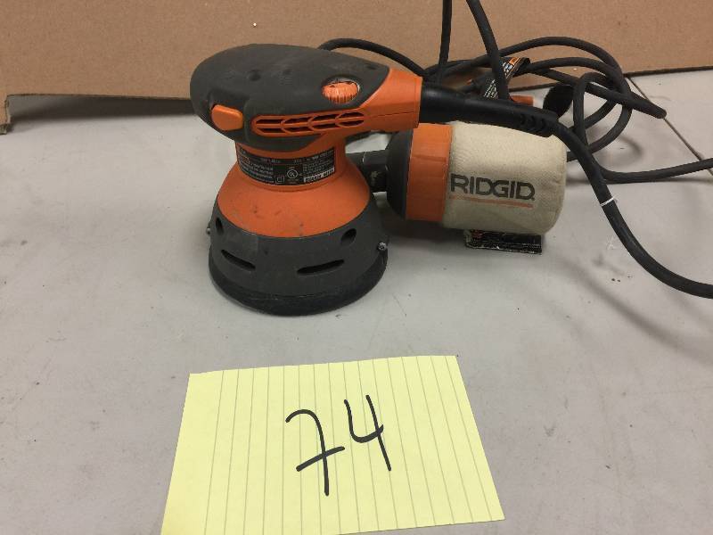 lot 74 image: RIDGID 5 in. Random Orbital Sander with AIRGUARD Technology in working conditions