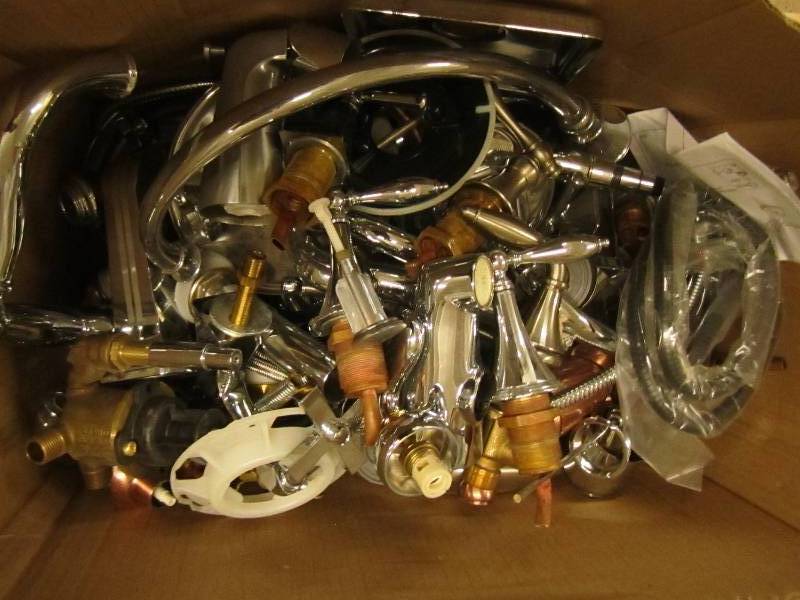 a lot of faucet, shower and other m...
