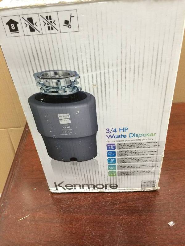 lot 41 image: Kenmore 70351 34 Horsepower Standard Garbage Disposer - Cool Gray brand new