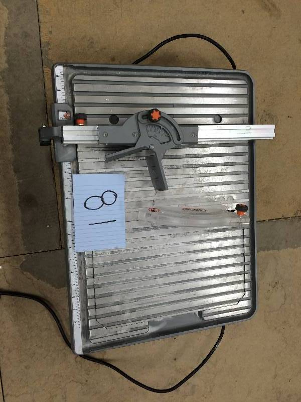 lot 81 image: RIDGID 7 in. Job Site Wet Tile Saw Model#  R4020  used in working conditions