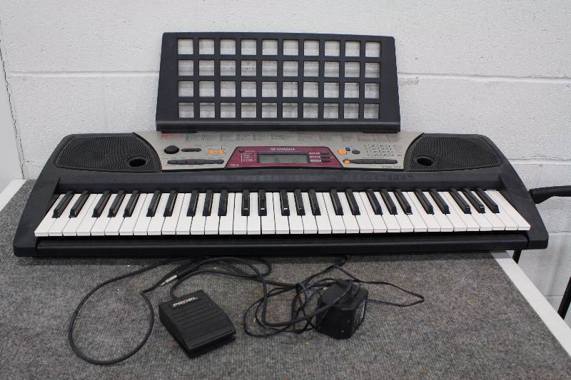 lot 24 image: Yamaha Portable Keyboard