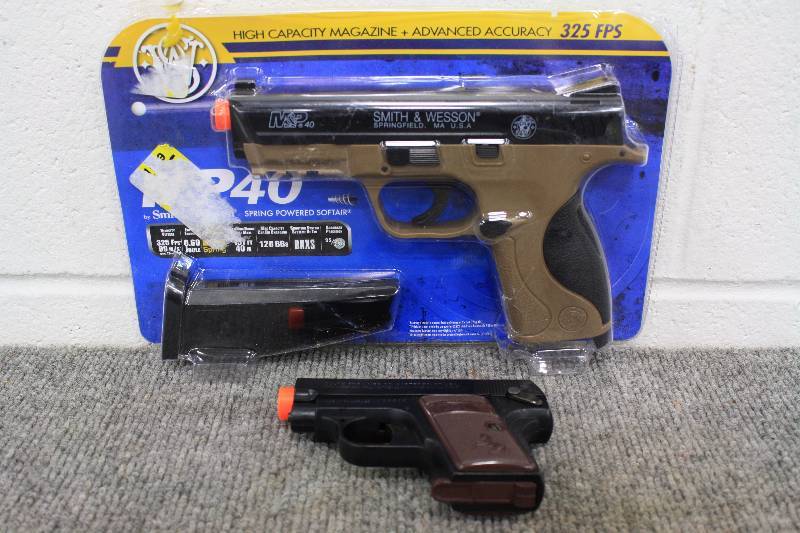 lot 57 image: Smith & Wesson and Colt 45 Air Soft Guns