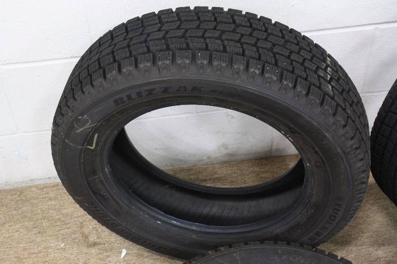 lot 20B image: Set of 4 New Bridgestone Tires - 19560R15