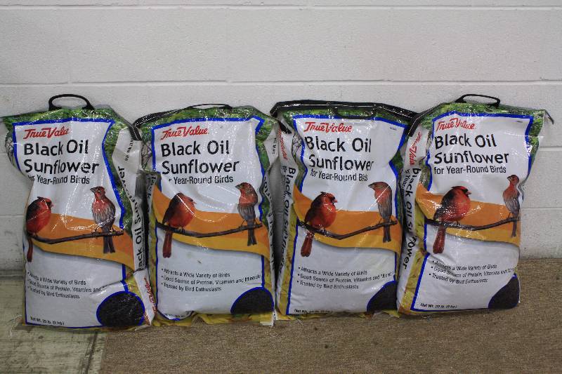 lot 221 image: 4qty 20lb Bags of Black Sunflower Bird Seed