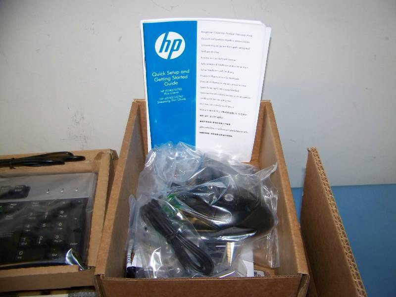 lot 36 image: Hewlett Packard (HP), HP t5740e, Thin Client Computer with Mini Tower, Keyboard and Mouse - NEW  NEVER USED