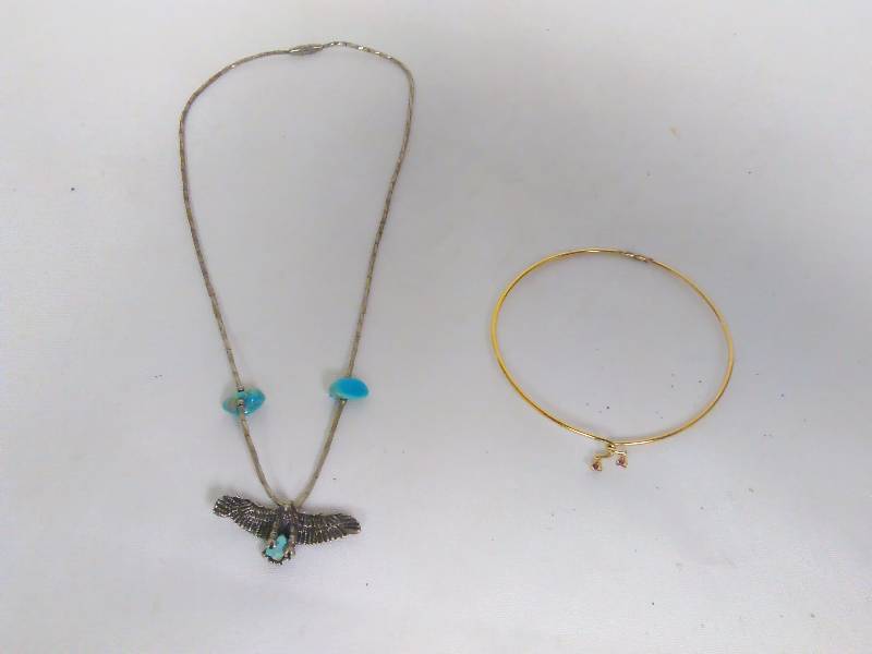 lot 47 image: Eagle Turquoise Necklace (15), Gold with interlocking bracelet with gemstones