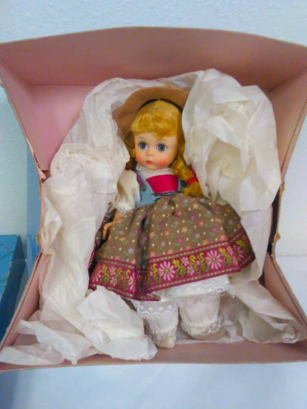 lot 52 image: Vintage Madame Alexander International, Austria Girl Doll, 1988