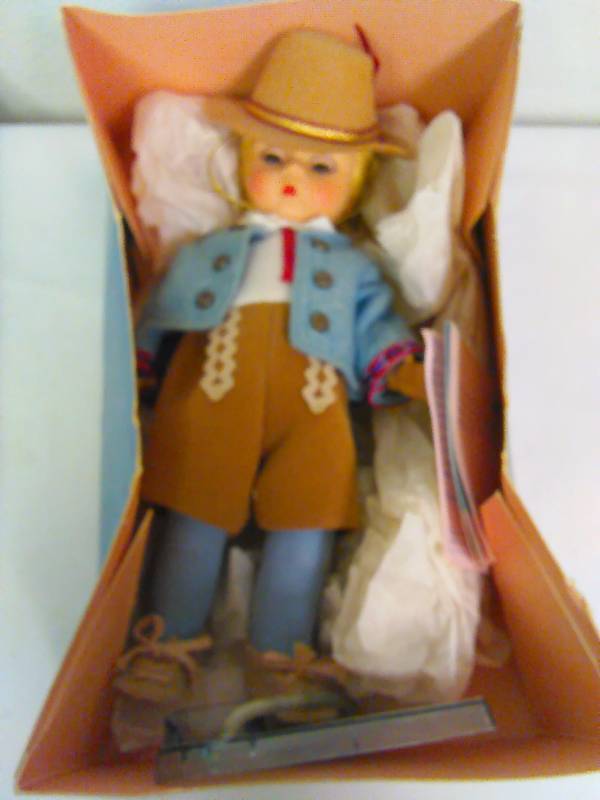 lot 53 image: Vintage Madame Alexander International, Austria Boy Doll, 1987