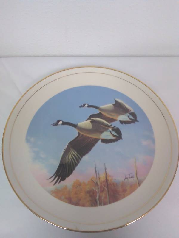 lot 106 image: Ducks Unlimited Plate, Larry Toschic, Canada Geese, 1987 Limited First Edition