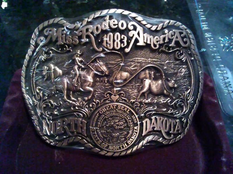lot 202 image: Vintage Belt Buckle, 1983 Miss Rodeo