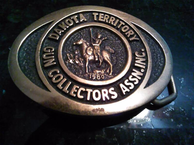 lot 237 image: Vintage Belt Buckle, Dakota Territory Gun Collectors