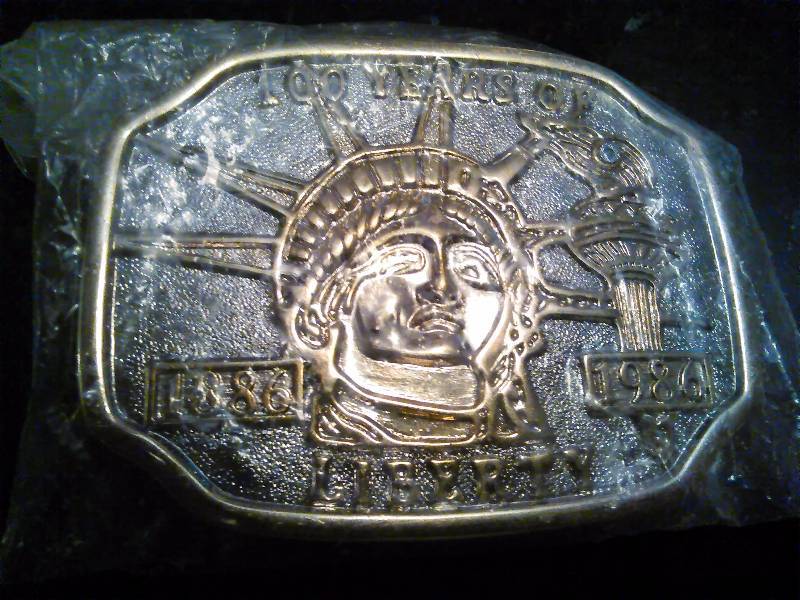 lot 224 image: Vintage Belt Buckle, 100 Years of the Statue of Liberty, 1886-1986 sealed