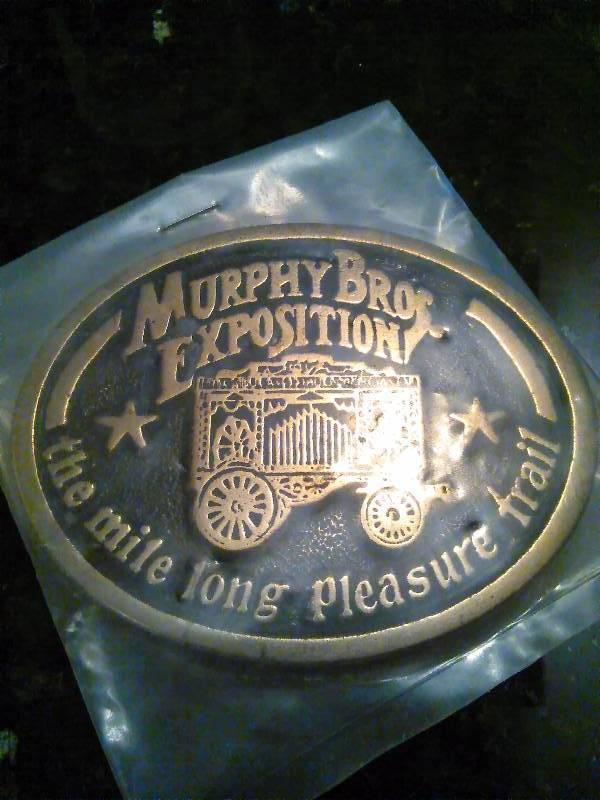 lot 222 image: Vintage Belt Buckle, Murphy Brothers Exposition, the mile-long pleasure trail, Bostock Buckle Sealed
