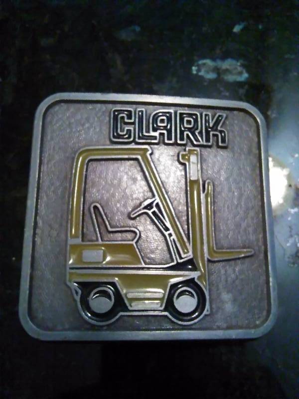 lot 221 image: Vintage Belt Buckle, Clark Forklift with resin colored lift, Silver color