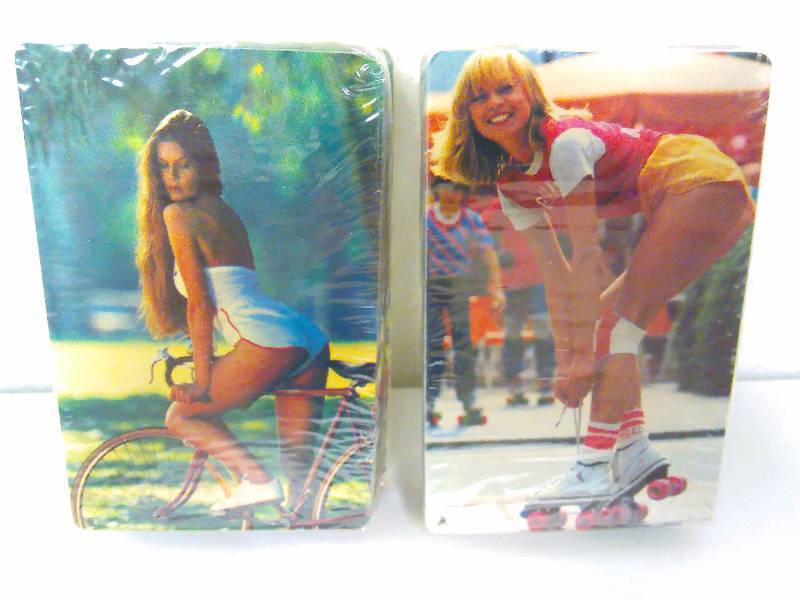 lot 133 image: Girls on Bike and Roller Skates Playing Cards (2) two sets of playing cards 4 decks