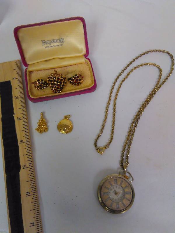 lot 149 image: Vintage Jeweled Strawberry Earring and Broach, Namo Watch Necklace, 2 gold tone charms