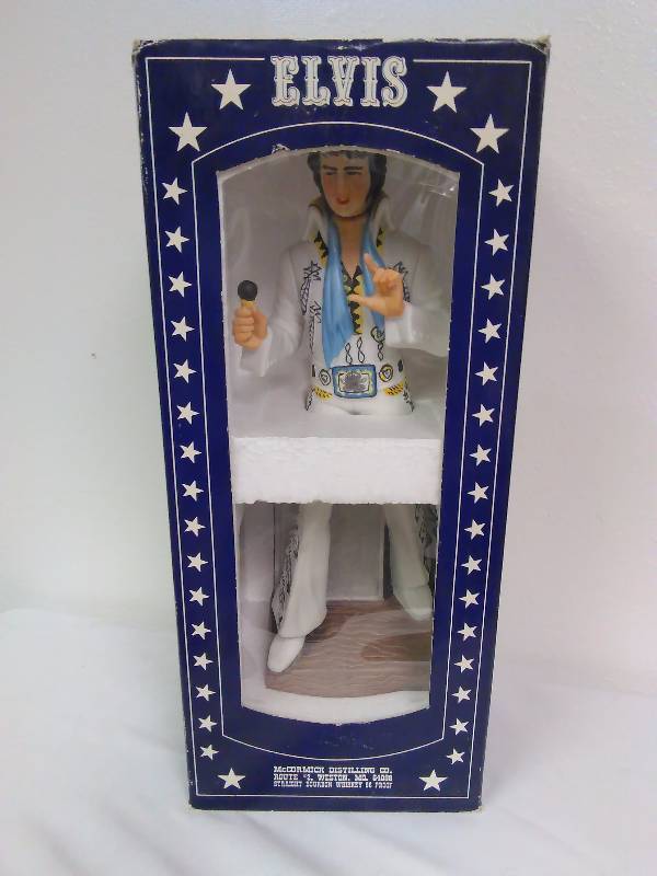 lot 188 image: Vintage McCormick Elvis Presley Yours 55 Elvis Music Box Decanter 8 1977 -Box