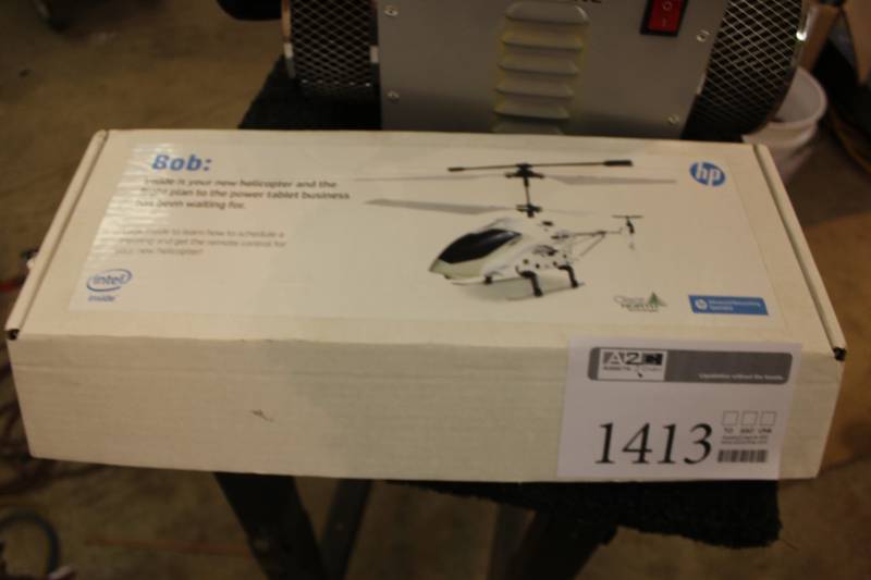 lot 1413 image: Clear North Technologies Remote Control Helicopter