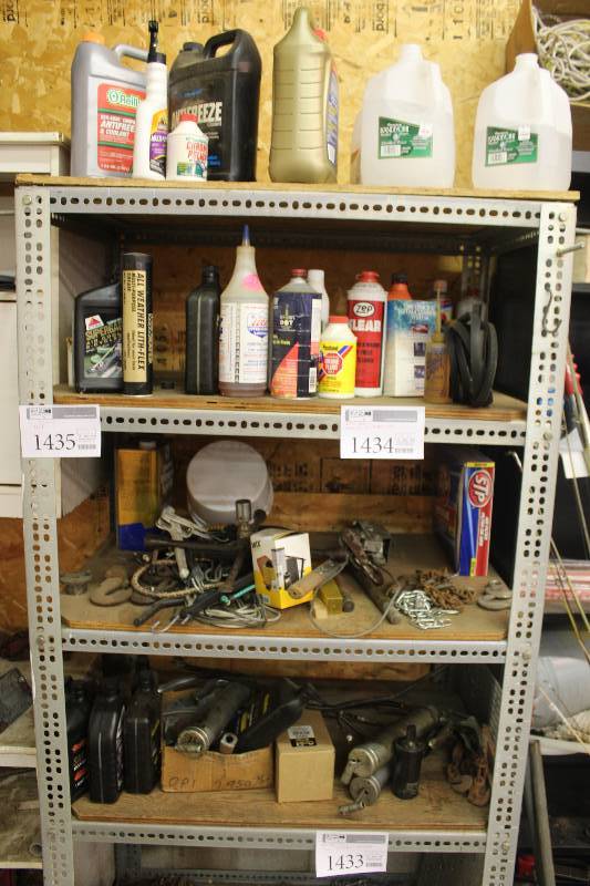 lot 1434 image: Rest of Shelves Includes Grease Gun, Oil, Bungee Cords, Winch