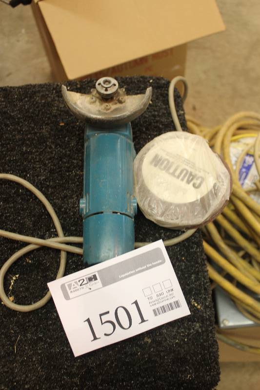 lot 1501 image: Makita 100mm Disc Grinder
