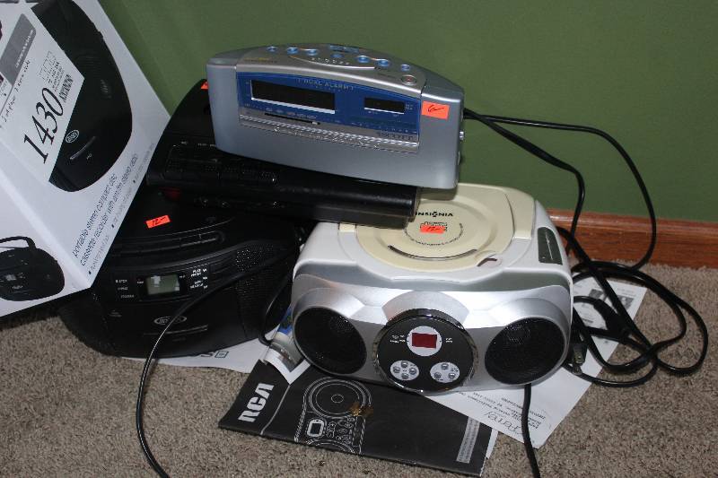 Lot of (4) Includes 2) Insignia, Jensen CD Player AND 2) Alarm Clocks