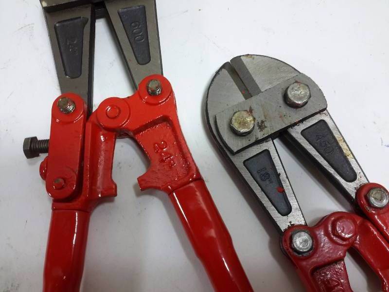 lot 47 image: 2 bolt cutters.  1, 24in  1, 18 in