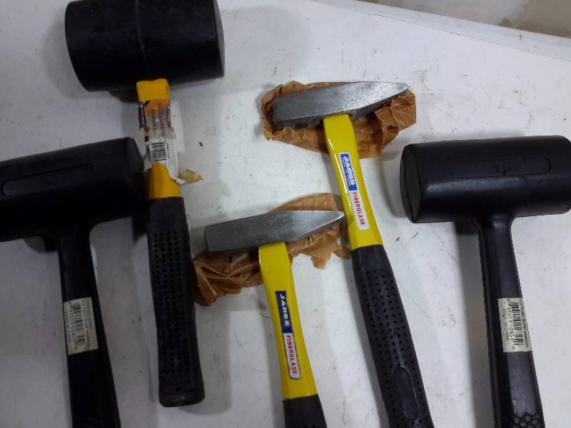 lot 109 image: 2, 3 lb Dead Blow hammers, 32 oz rubber hammer, 2 Fiber Glass handle hammers