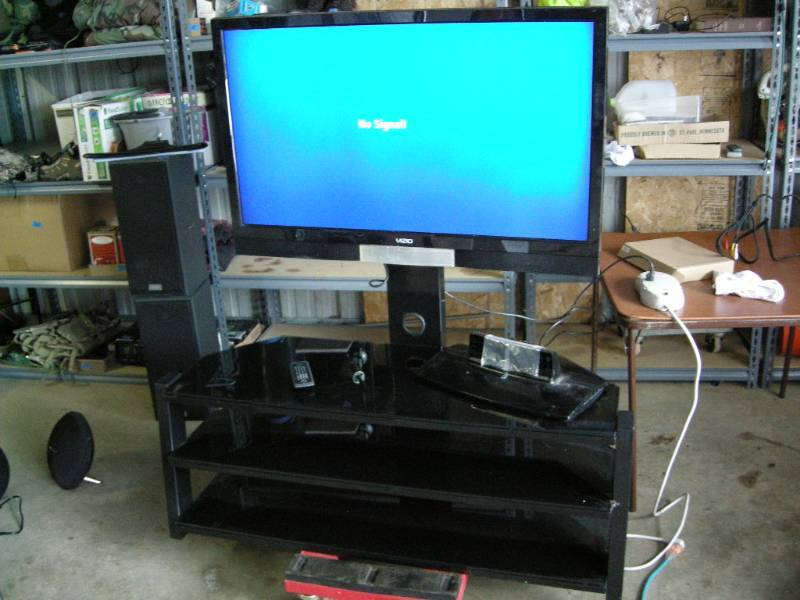 lot 1 image: Vizio 42 LCD TV with stand