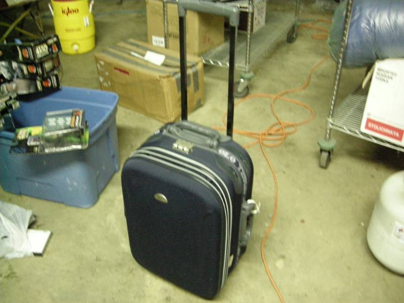 lot 50 image: Polo Trump Rolling Travel Bag
