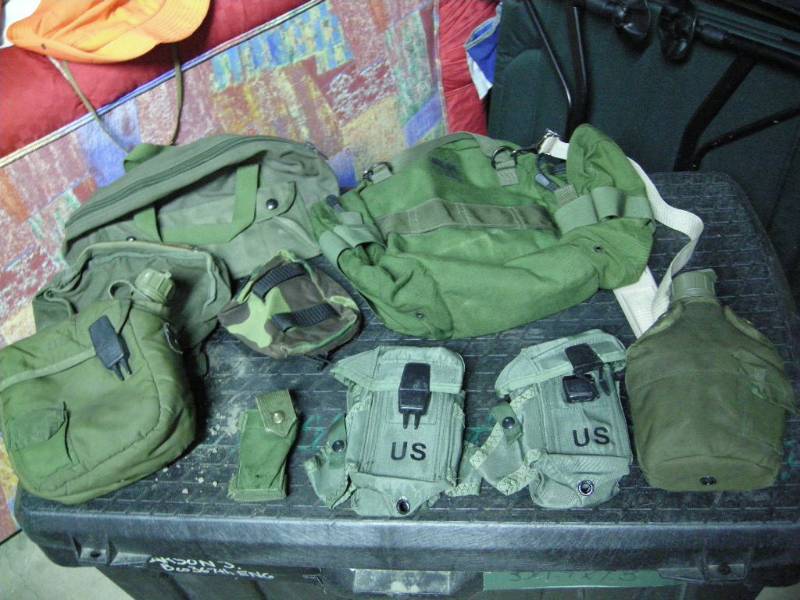 lot 63 image: Military Issue PacksBagsCanteens