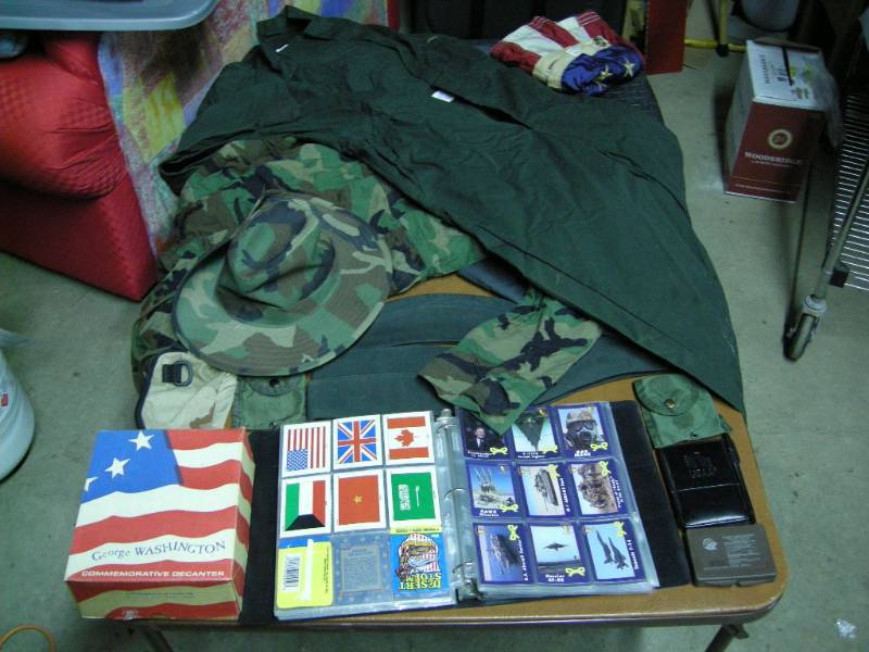 lot 65 image: US Military Clothing, Cards, Accessories