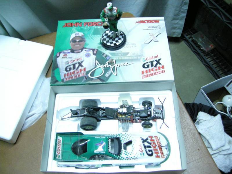 lot 73 image: Signed John Force Action Die Cast Car