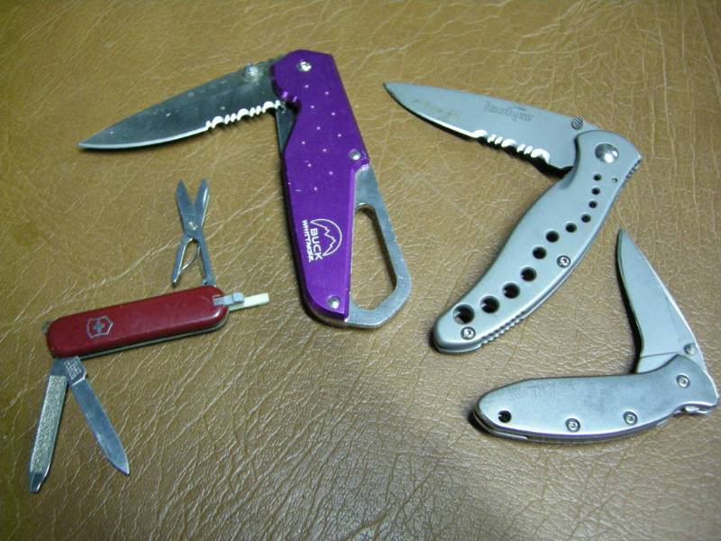 lot 91 image: Buck, Kershaw, Victorinox Knives
