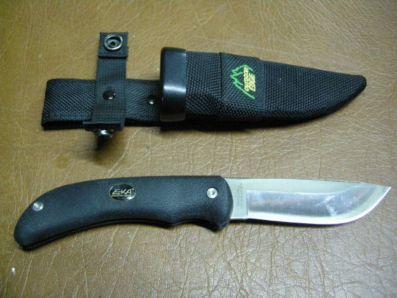 lot 92 image: EKA Outdoor Edge Swing Blade Knife