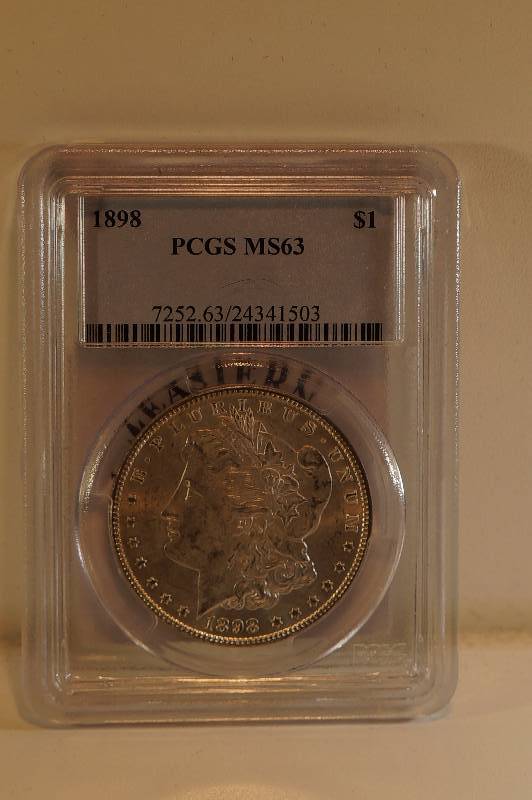 Graded Morgan Silver Dollar