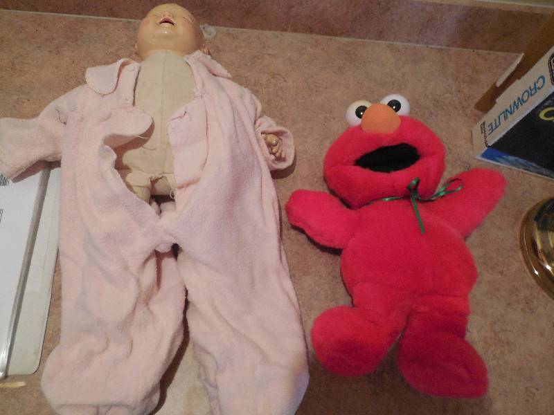 lot 16 image: ANTIQUE DOLL AND ELMO