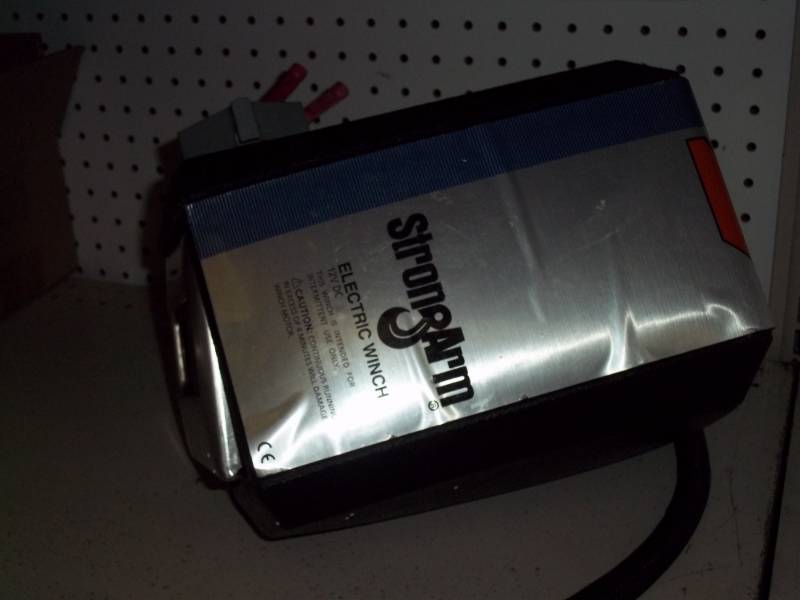 lot 12 image: Strong Arm Electric Winch 12v
