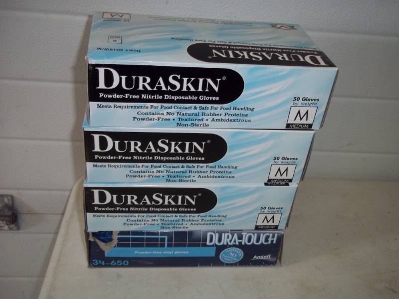 lot 82 image: 4 boxes of Nitrile Gloves size M