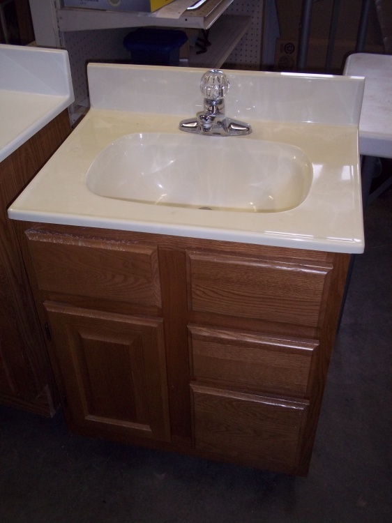 lot 103 image: 24 Sink, Vanity and Faucet