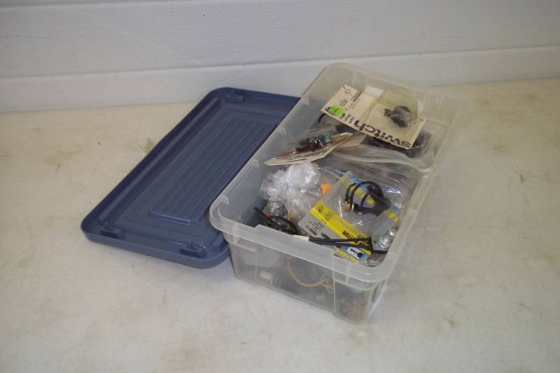 lot 121 image: Tote of Electrical Switches