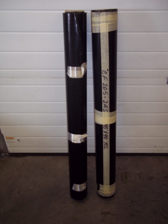 lot 195 image: 2 Black rolls of vinyl one roll is 40 x 40yds