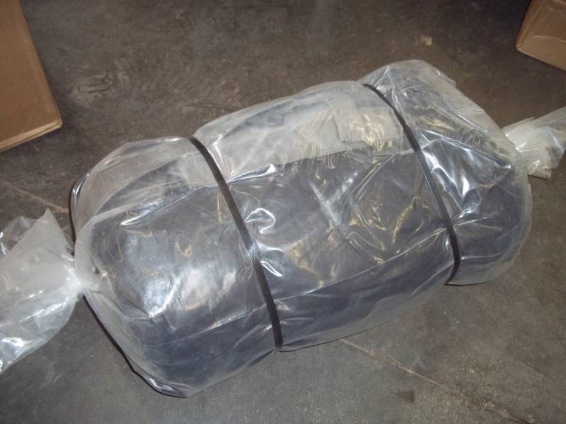 lot 204 image: Rolled tarp size unknown