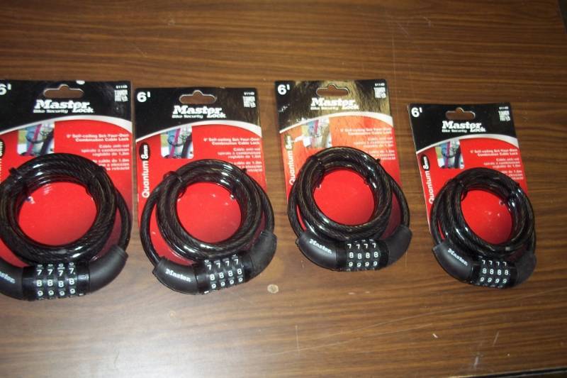 lot 220 image: Case of 4 master lock bike locks