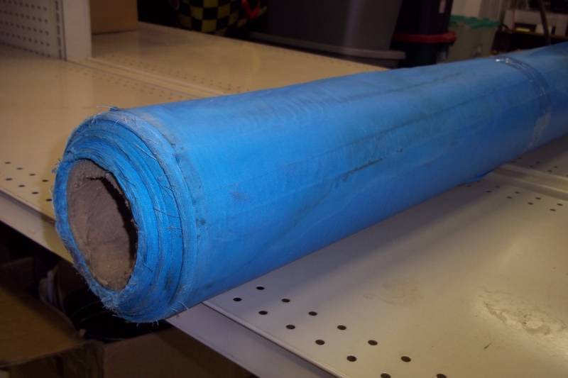 lot 241 image: Roll of blue vinyl 43
