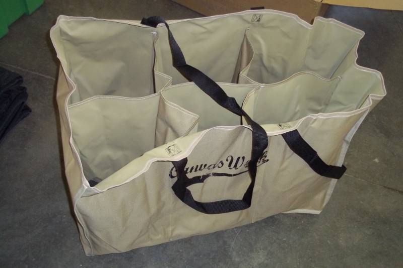 lot 262 image: Decoy bag 22 x 21 x 32 has 6 compartments and mesh bottom
